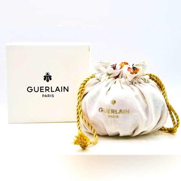GUERLAIN Handbags - Guerlain White Drawstring Pouch